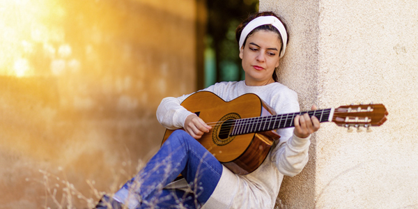 Woman Playing Guitar